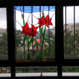 red-flowers-in-a-window-stained-glass