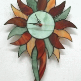 stained-glass-wall-clock-red-green-sun-flawer